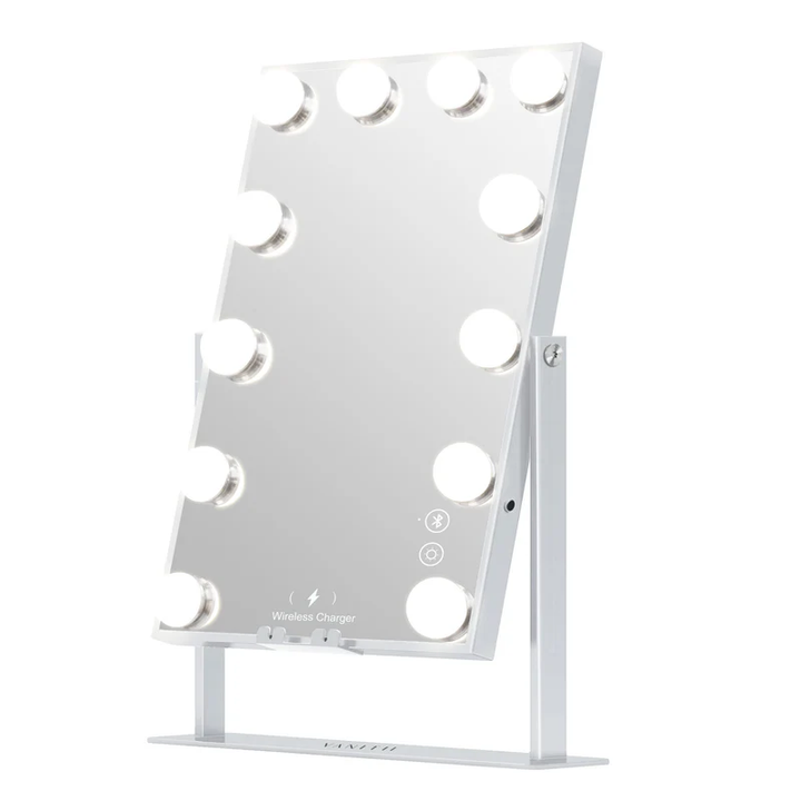 a vanity mirror with lights on it